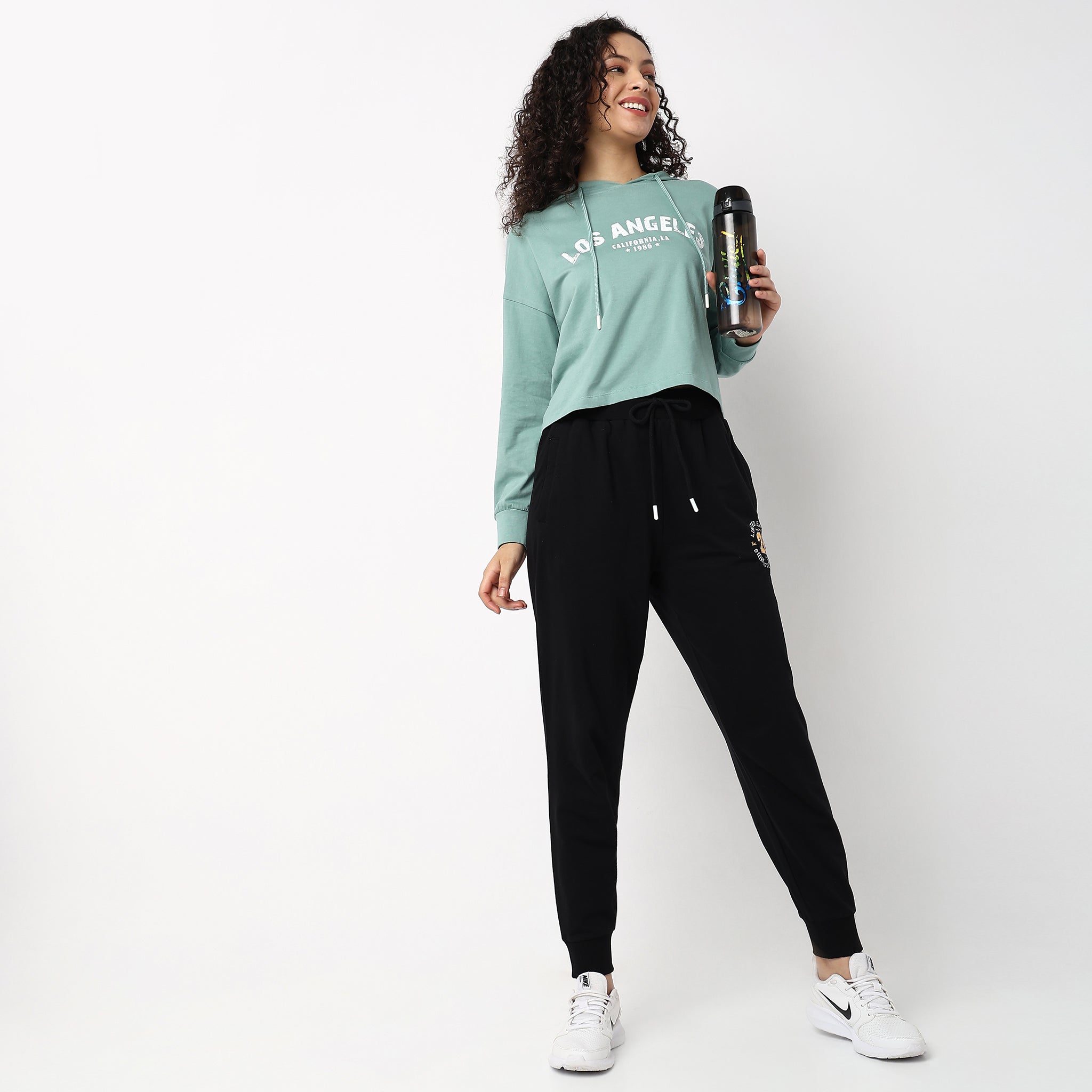Women Wearing Regular Fit Graphic High Rise Joggers