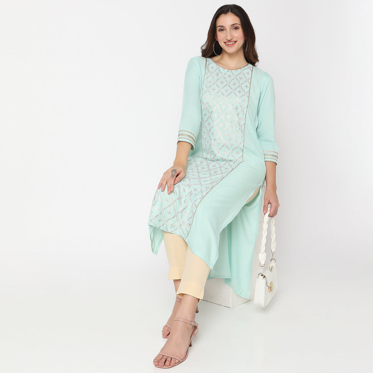 Women Wearing Straight Fit Printed Kurta