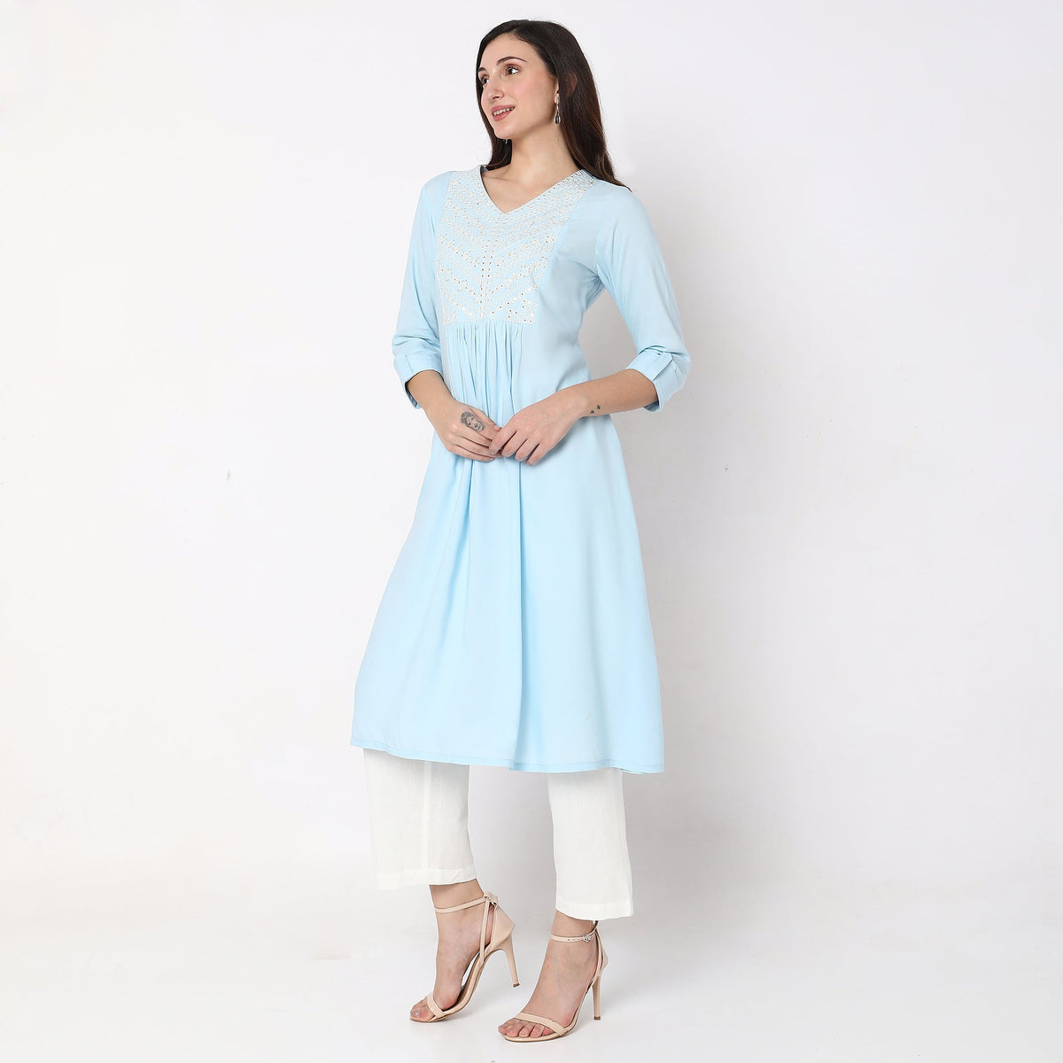 Women Wearing Flare Fit Embellished Kurta