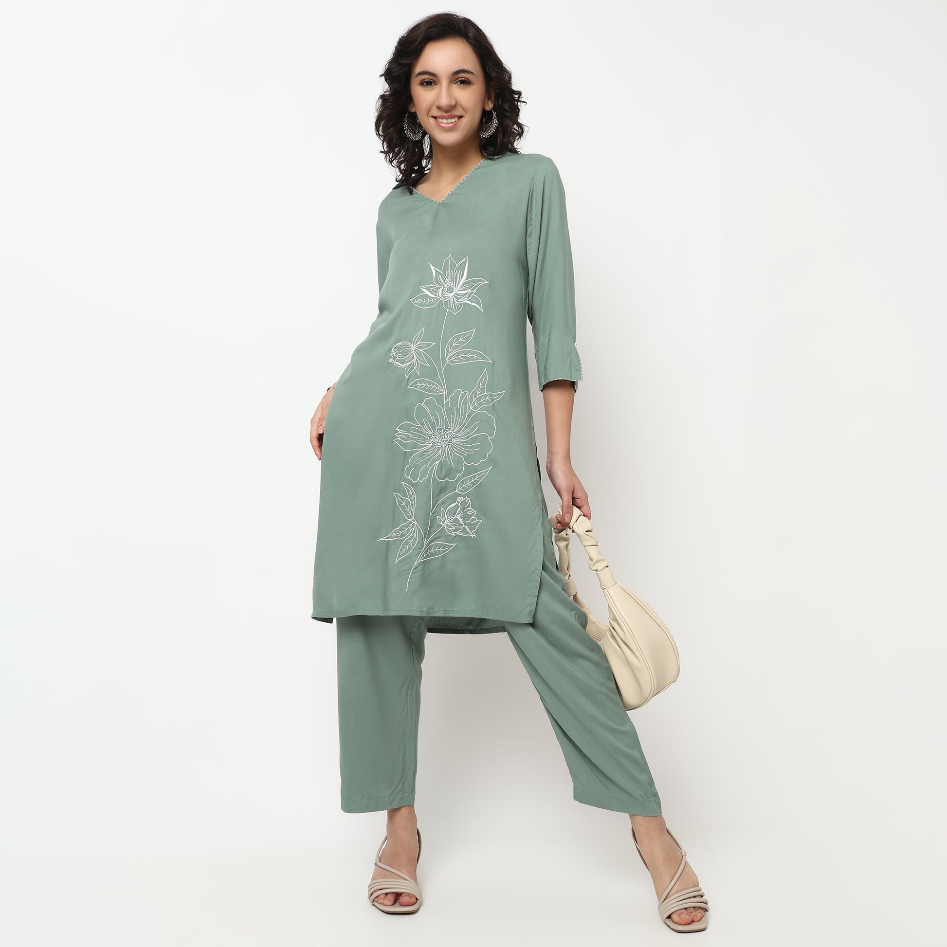 Buy Women Straight Fit Solid Three-Fourth Sleeve Kurta with Pant Set  - Style Union