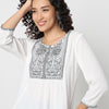 Flare Fit Embroidered Round Neck Top