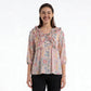 Printed Peplum Top With Ruffle and Tie-Up Neck Detail