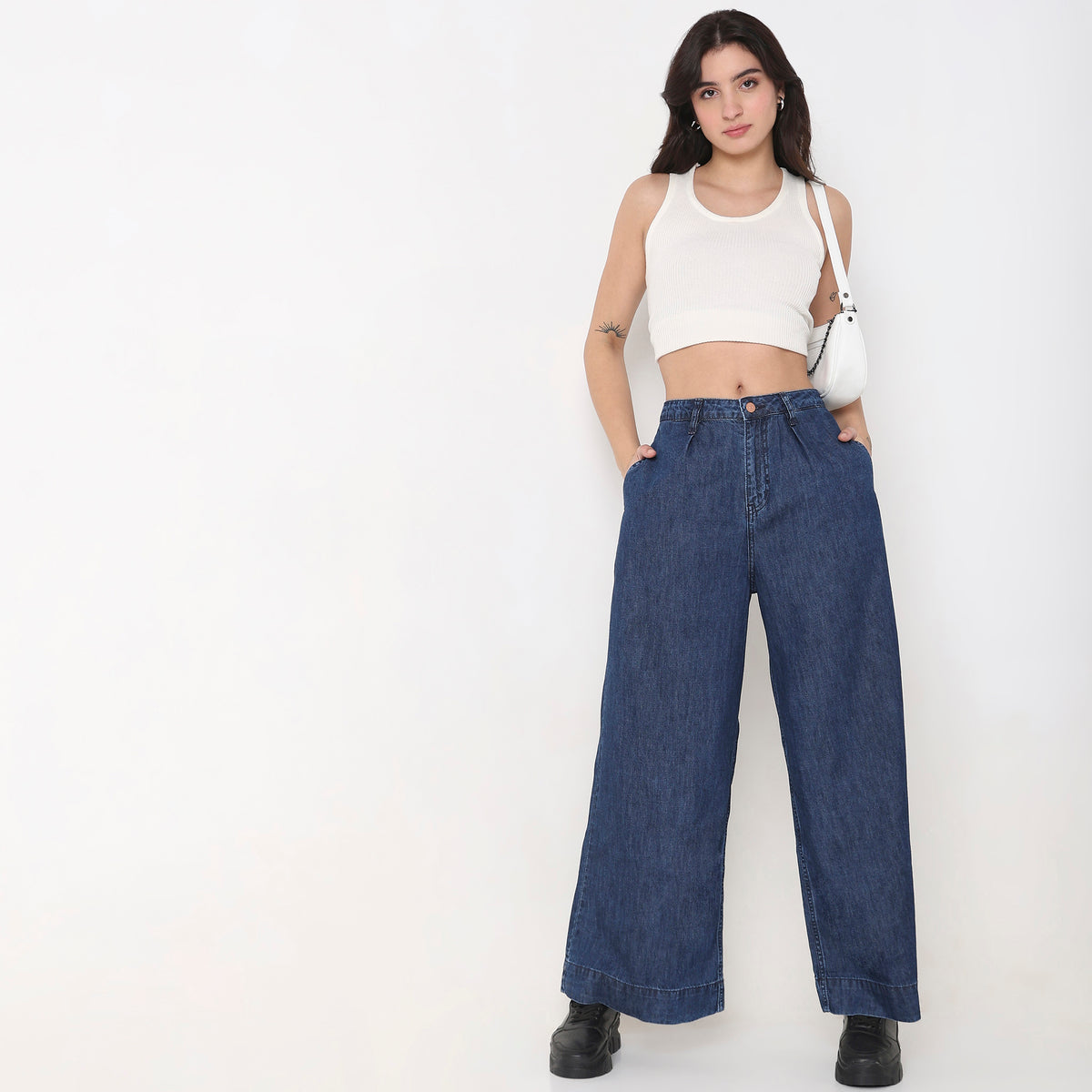 Women Wearing Wide Leg Solid High Rise Jean