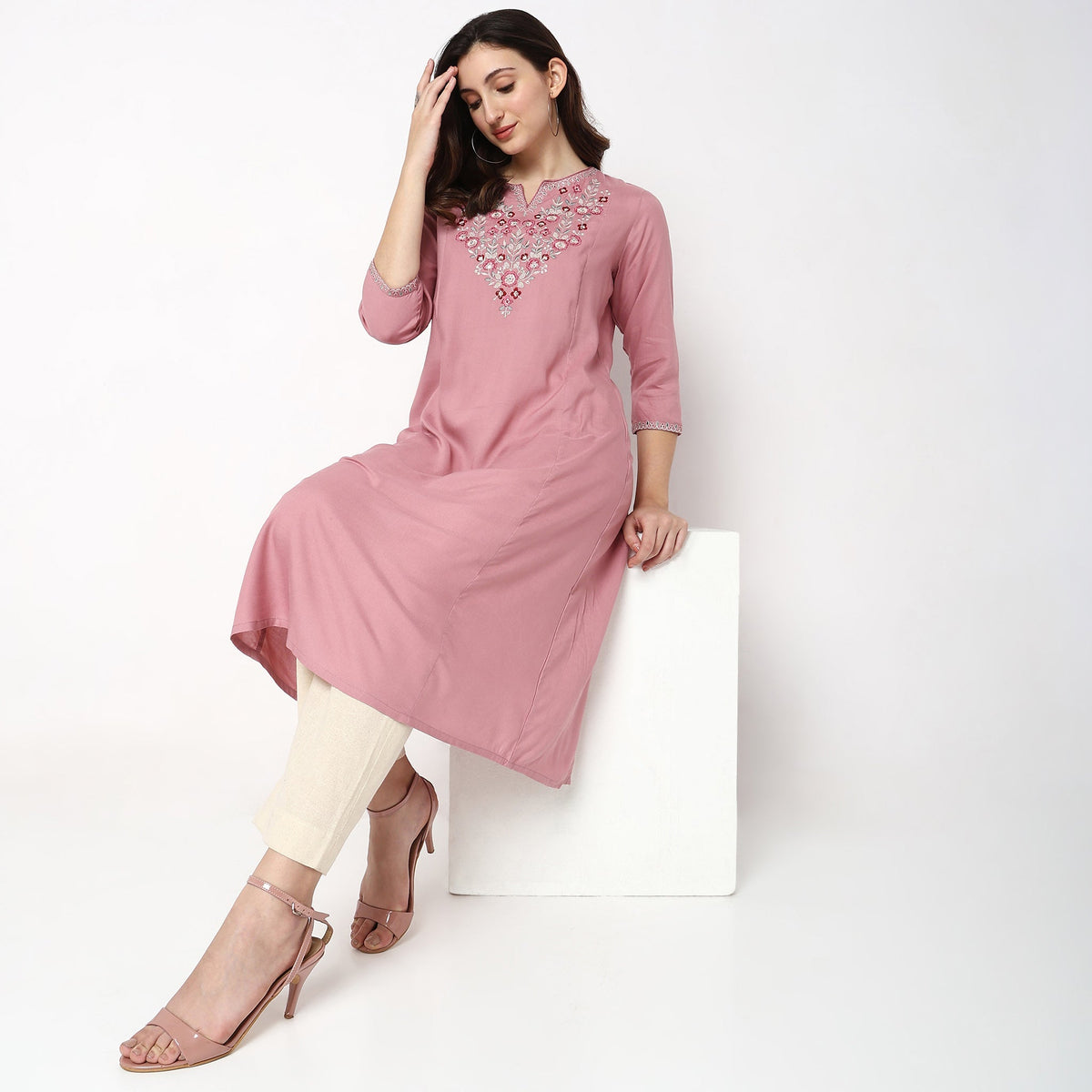Women Wearing Flare Fit Embroidered Kurta