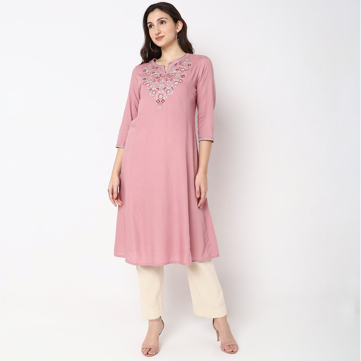 Women Wearing Flare Fit Embroidered Kurta