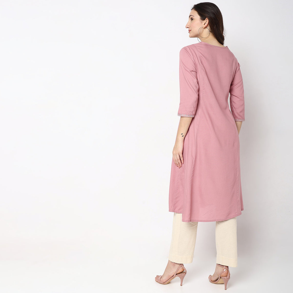 Women Wearing Flare Fit Embroidered Kurta