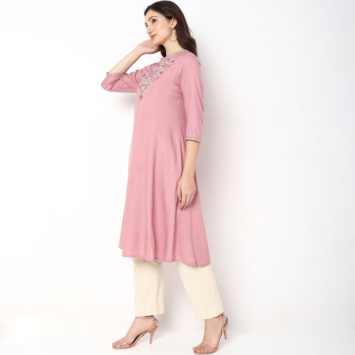 Women Wearing Flare Fit Embroidered Kurta
