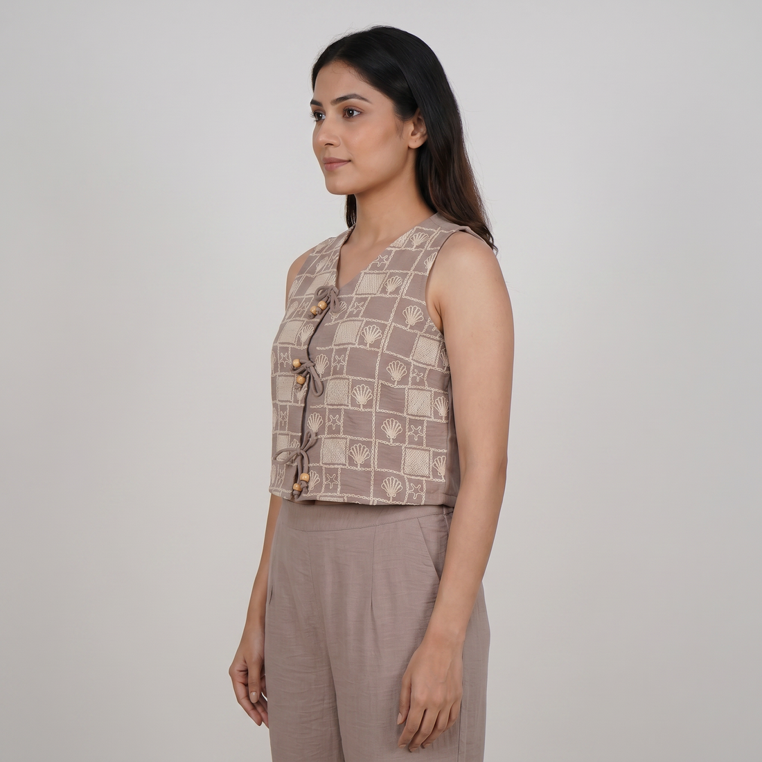 Sleeveless Embroidered Shrug Top