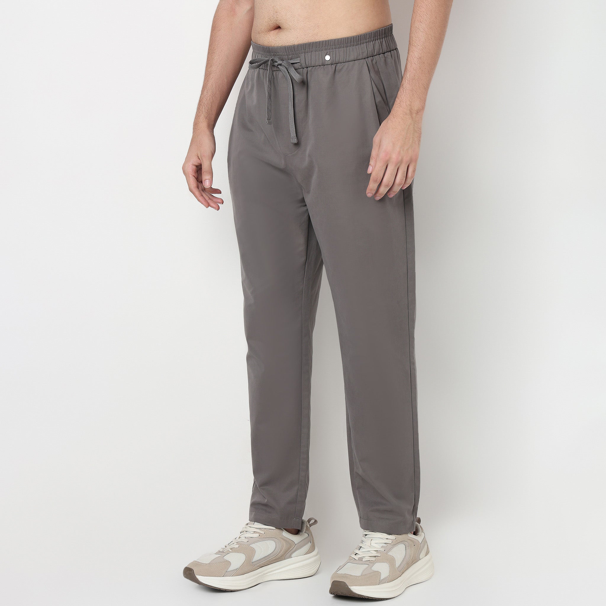 Buy Men Regular Fit Solid Ankle Length Mid Rise Pants