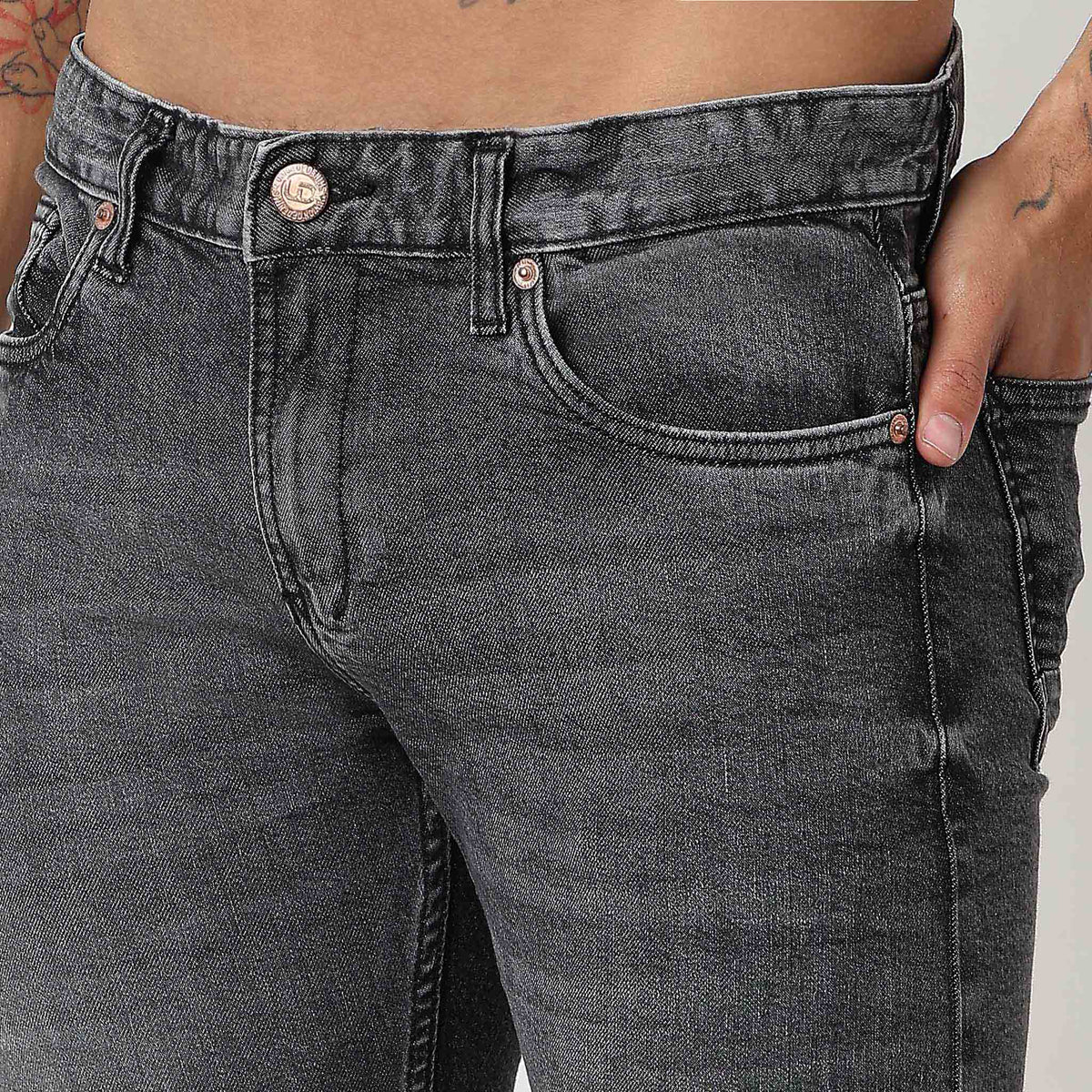 Tapered Fit Solid Mid Rise Jeans