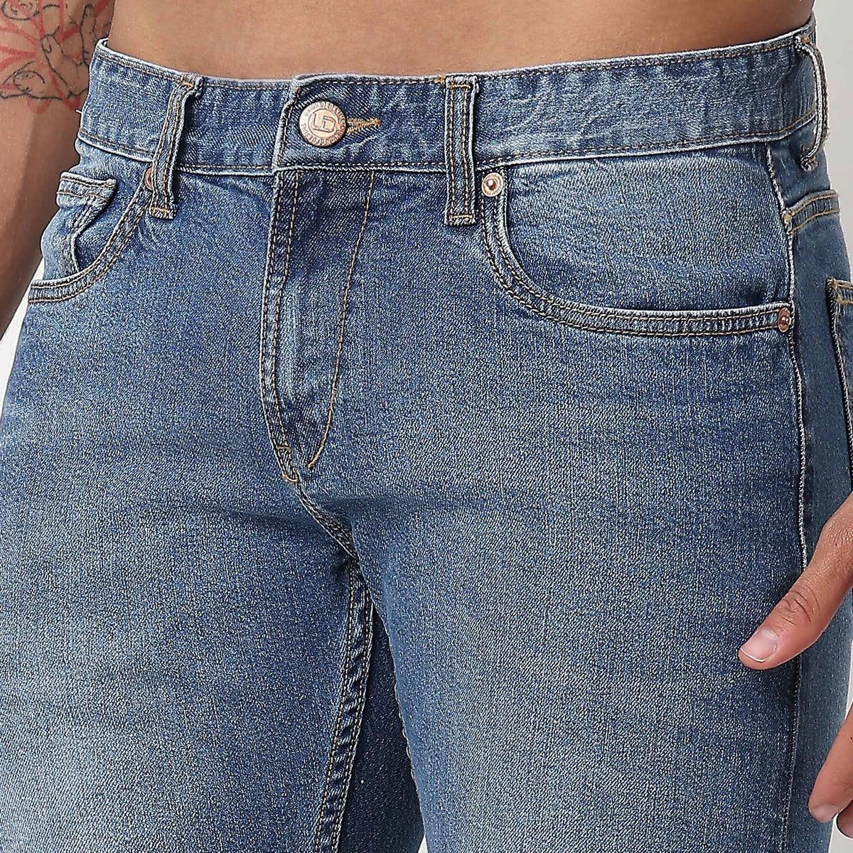 Tapered Fit Solid Mid Rise Jeans