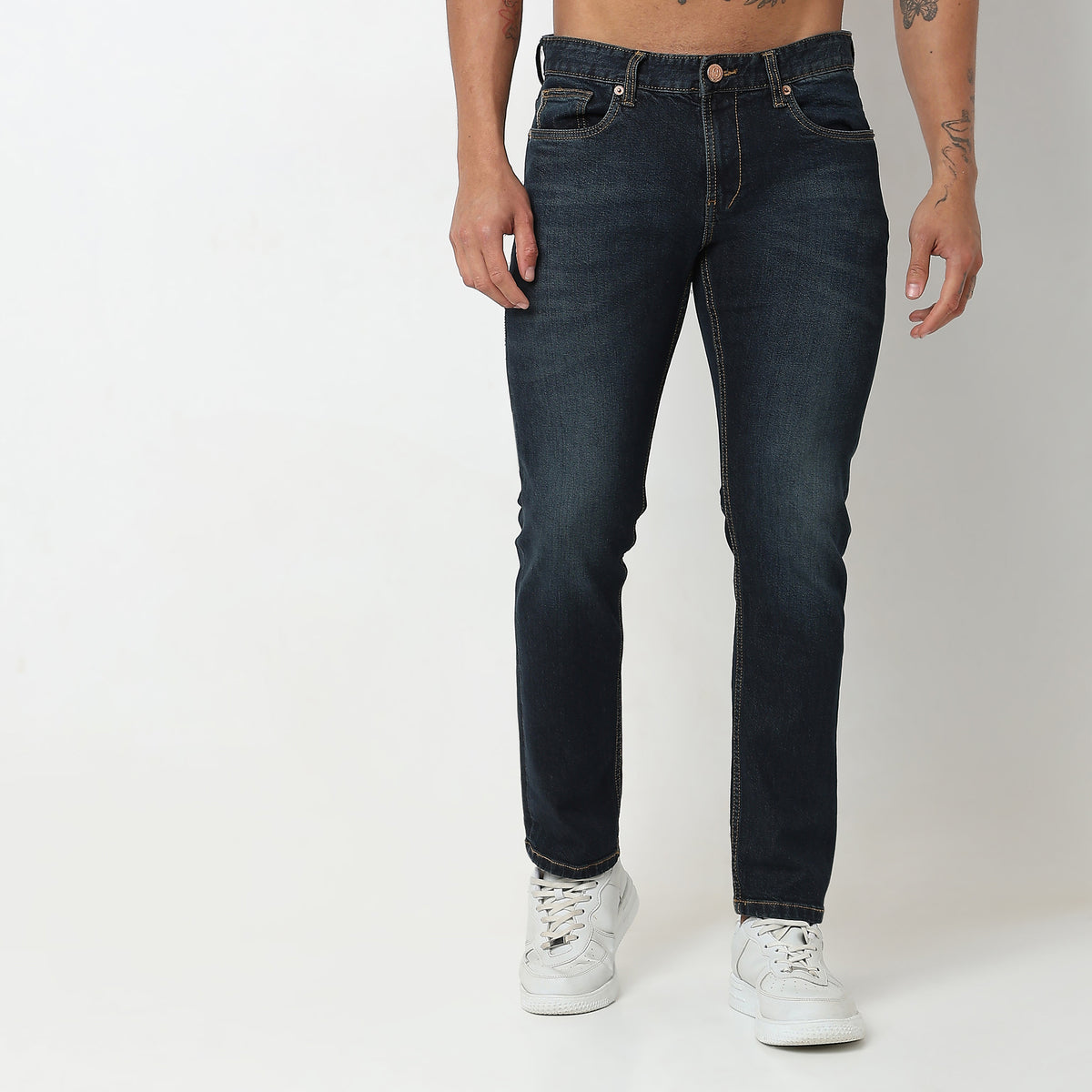 Tapered Fit Solid Mid Rise Jeans