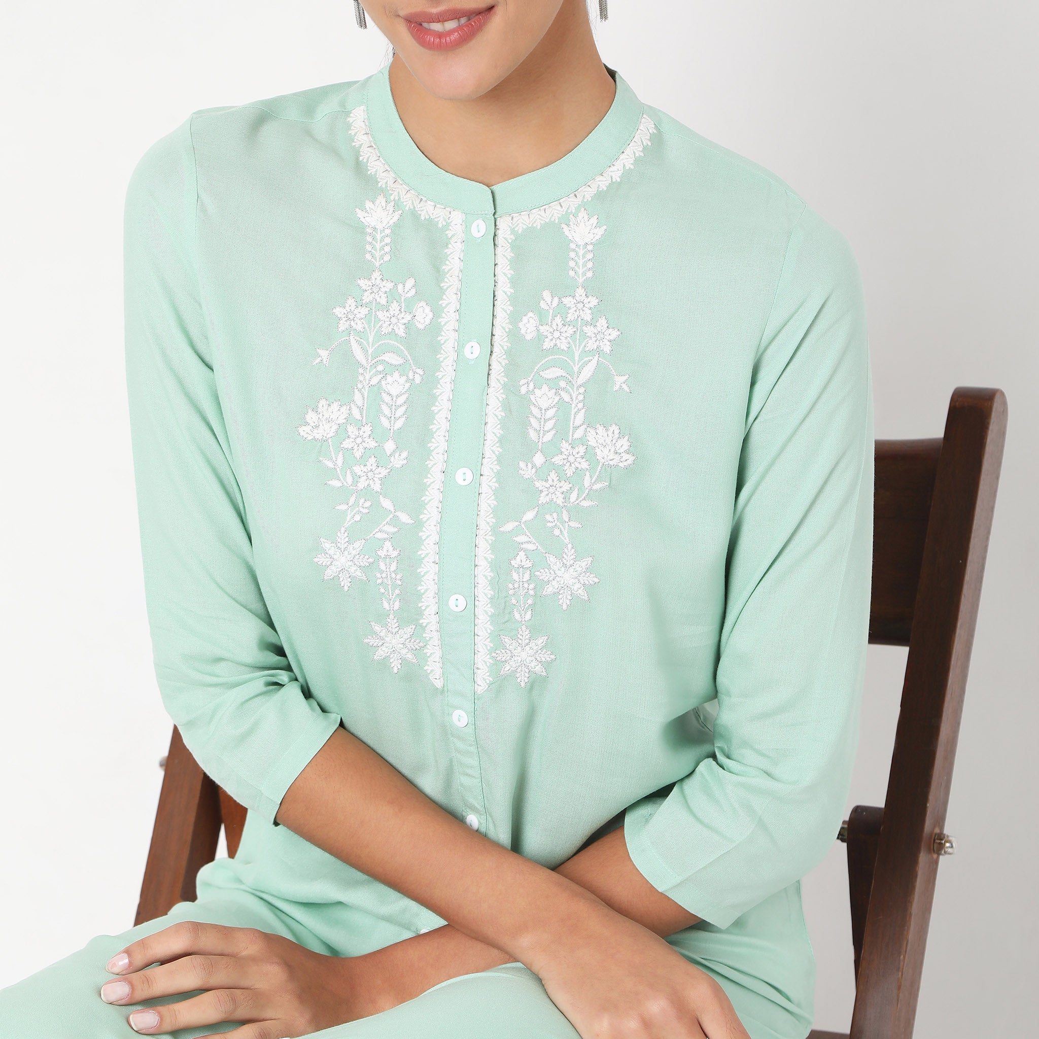 Women Wearing Regular Fit Embroidered Top