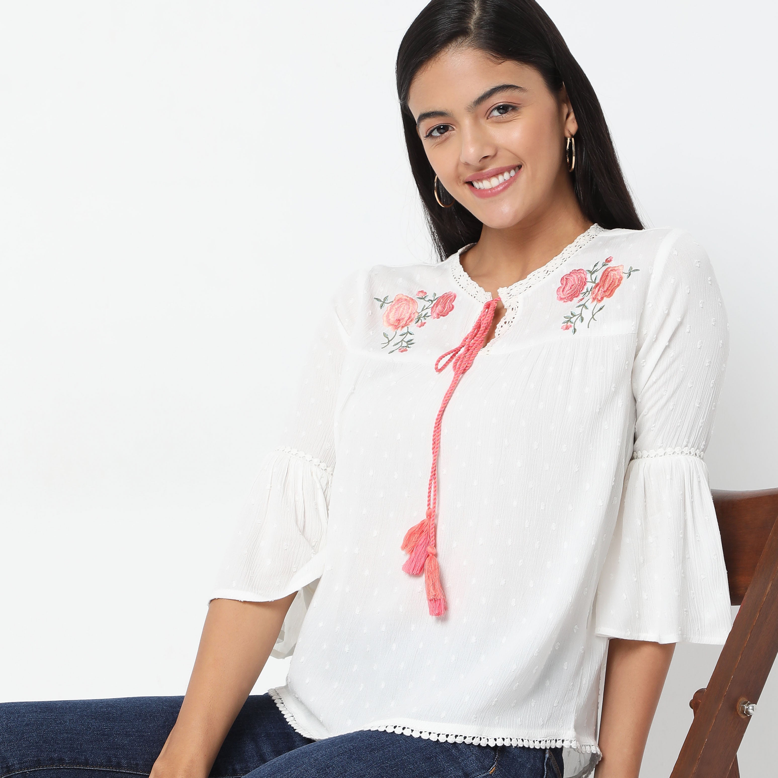 Women Wearing Regular Fit Embroidered Top