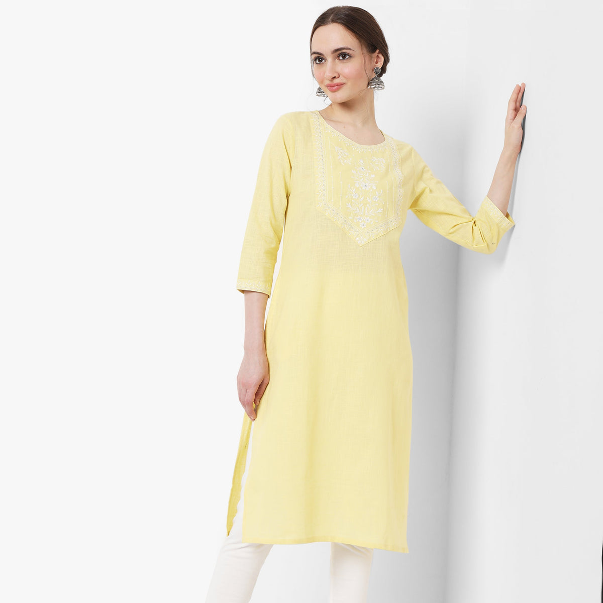 Women Wearing Regular Fit Embroidered Kurta