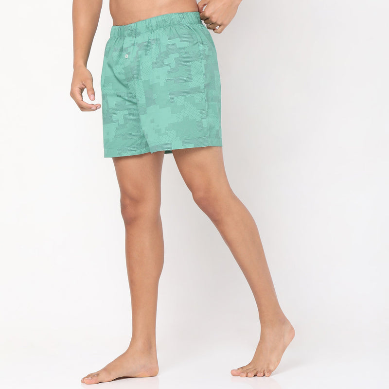 Men Wearing Relaxed Fit Printed Mid Rise Short