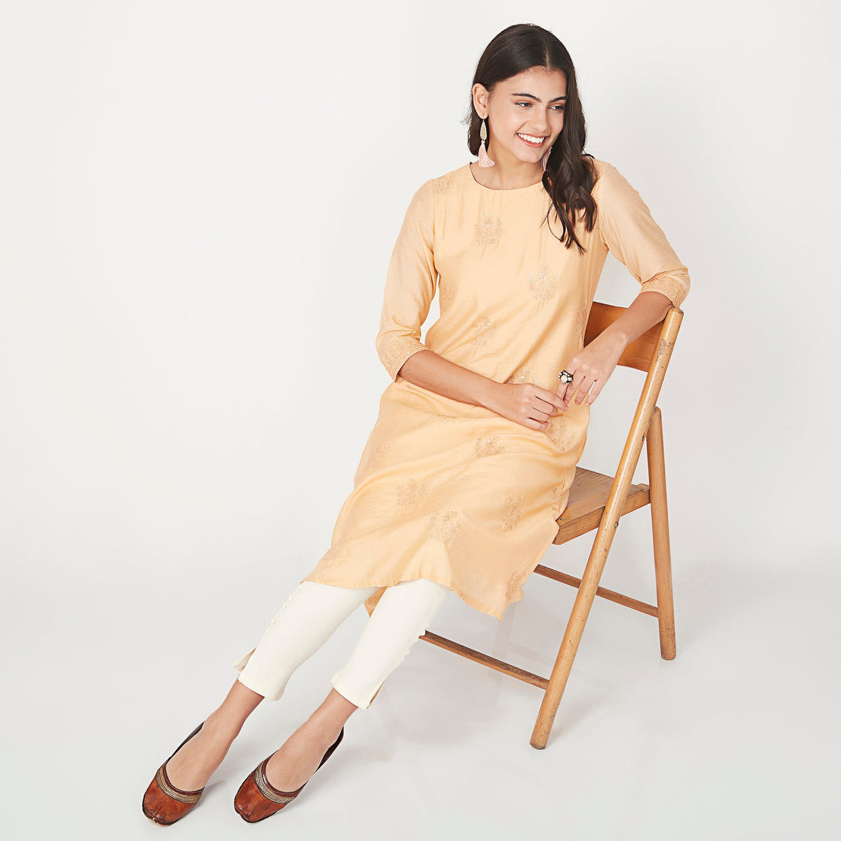 Women Wearing Relaxed Fit Embroidered Kurta