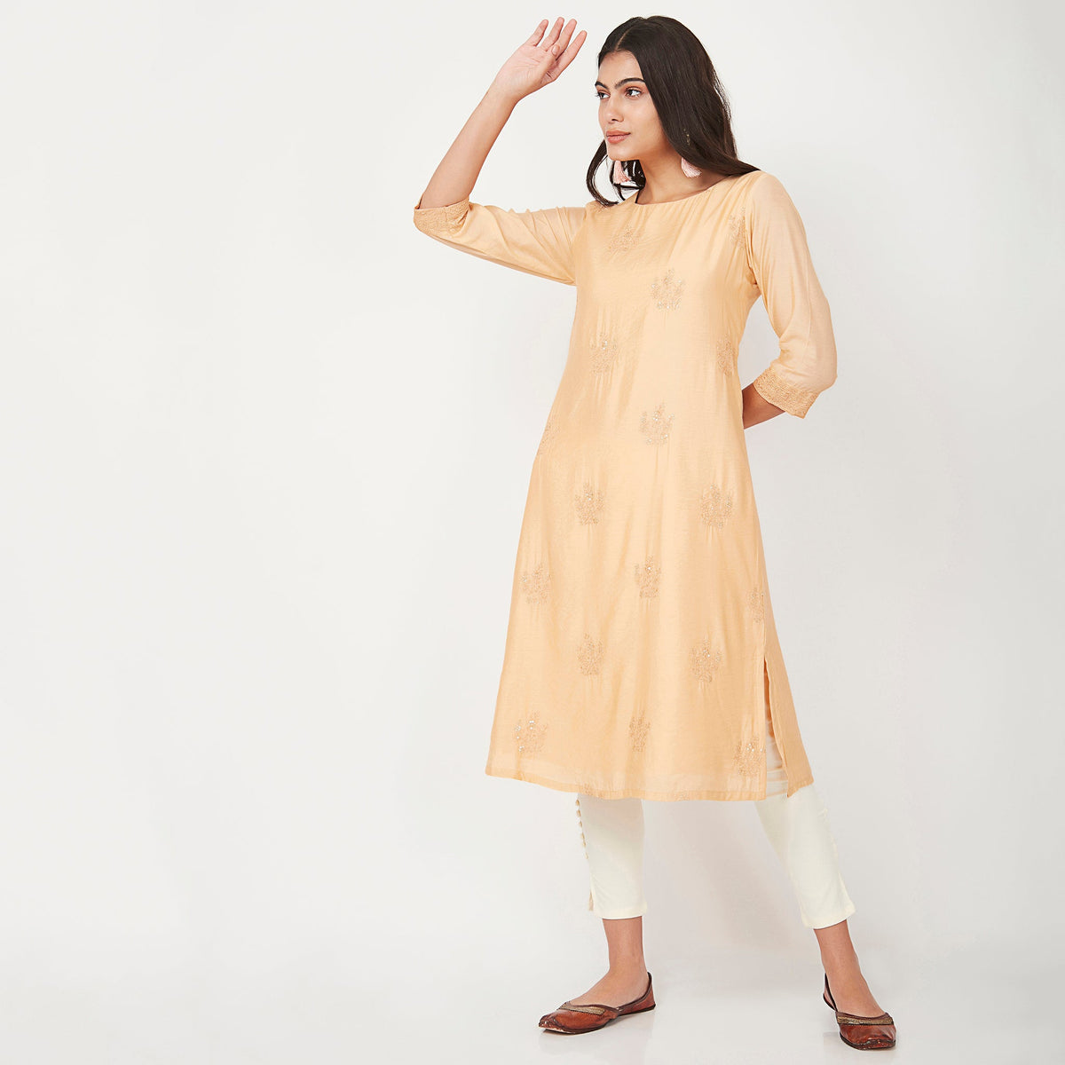 Women Wearing Relaxed Fit Embroidered Kurta