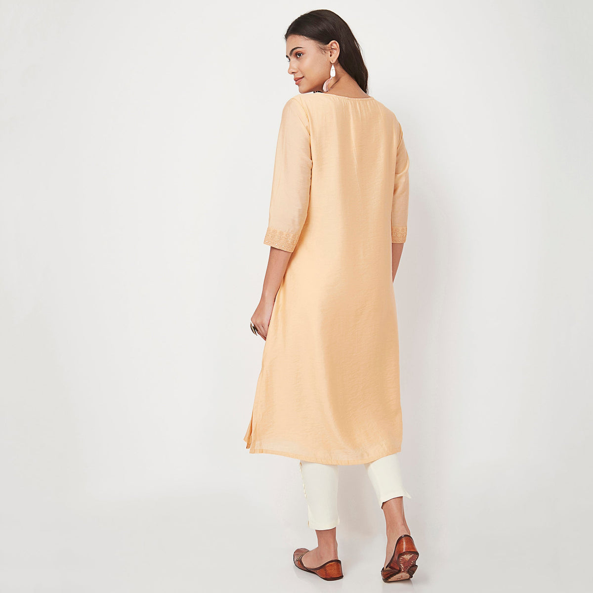 Women Wearing Relaxed Fit Embroidered Kurta