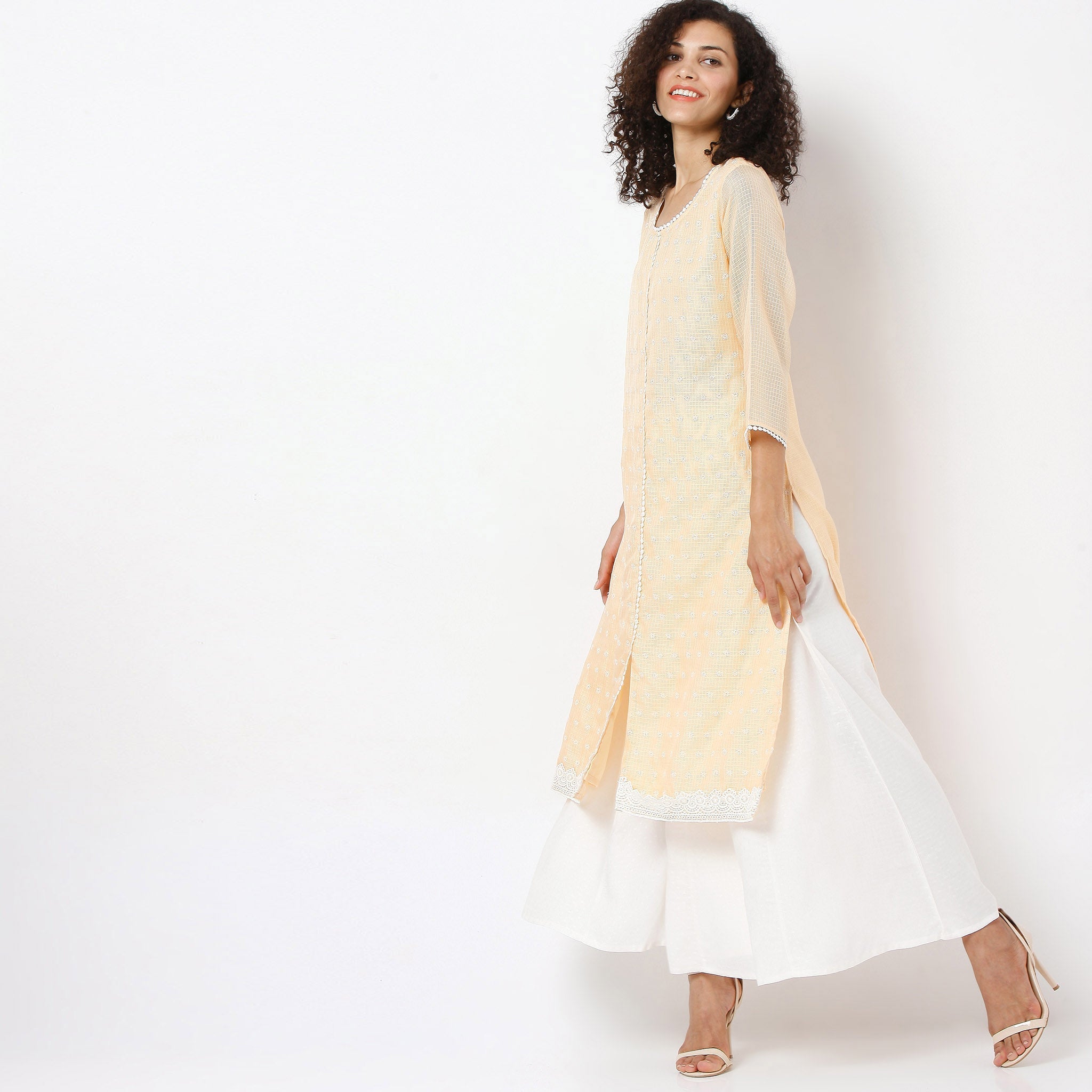 Women Wearing Relaxed Fit Embroidered Kurta