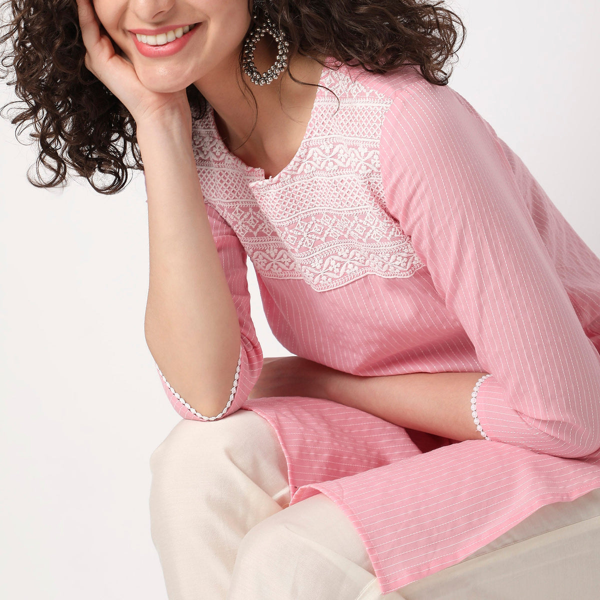 Women Wearing Straight Fit Embroidered Kurta