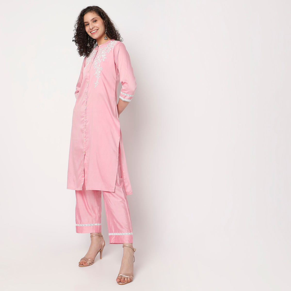 Women Wearing Straight Fit Embroidered Kurta