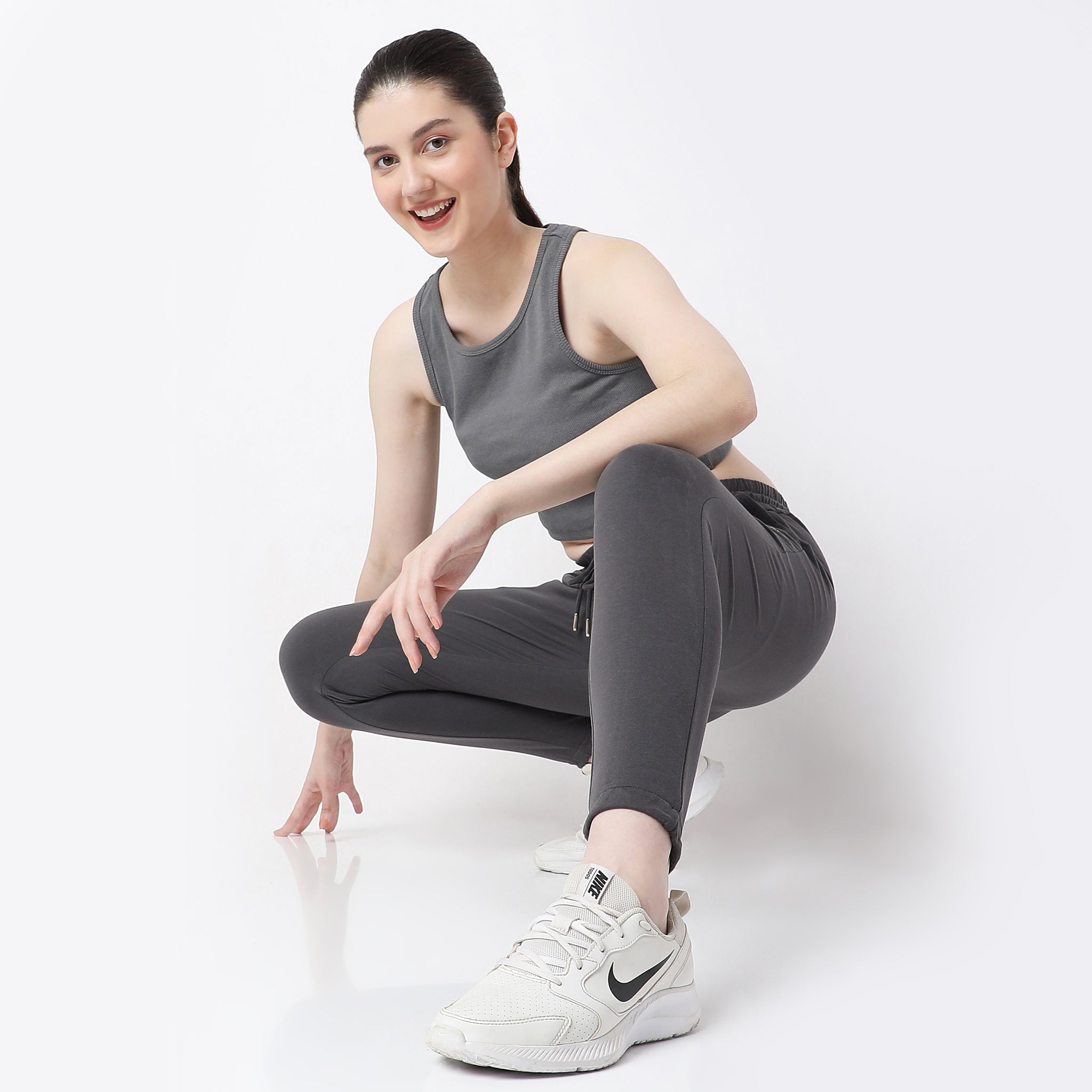Women Wearing Regular Fit Solid High Rise Joggers