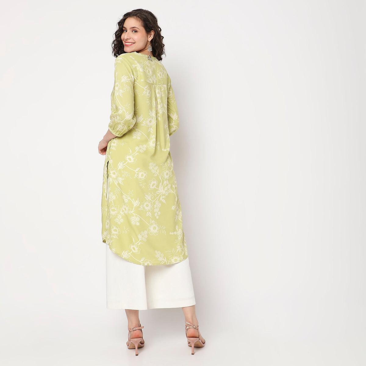 Women Wearing Flare Fit Floral Kurta