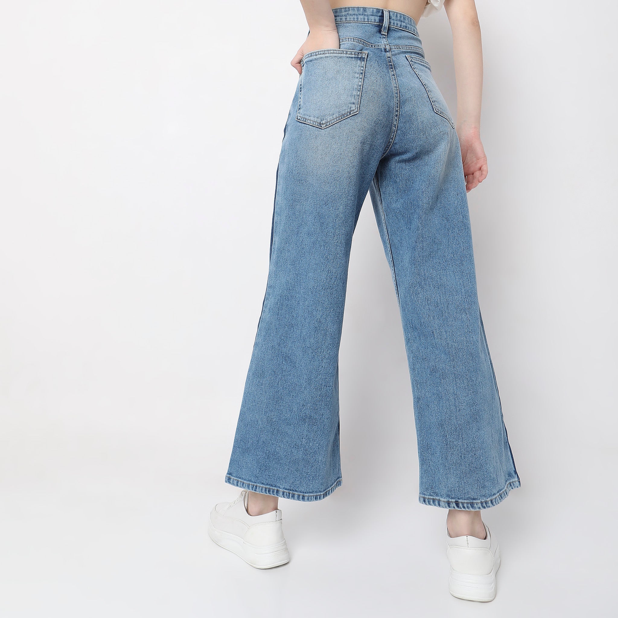 Women Wearing Flare Fit Solid High Rise Jean