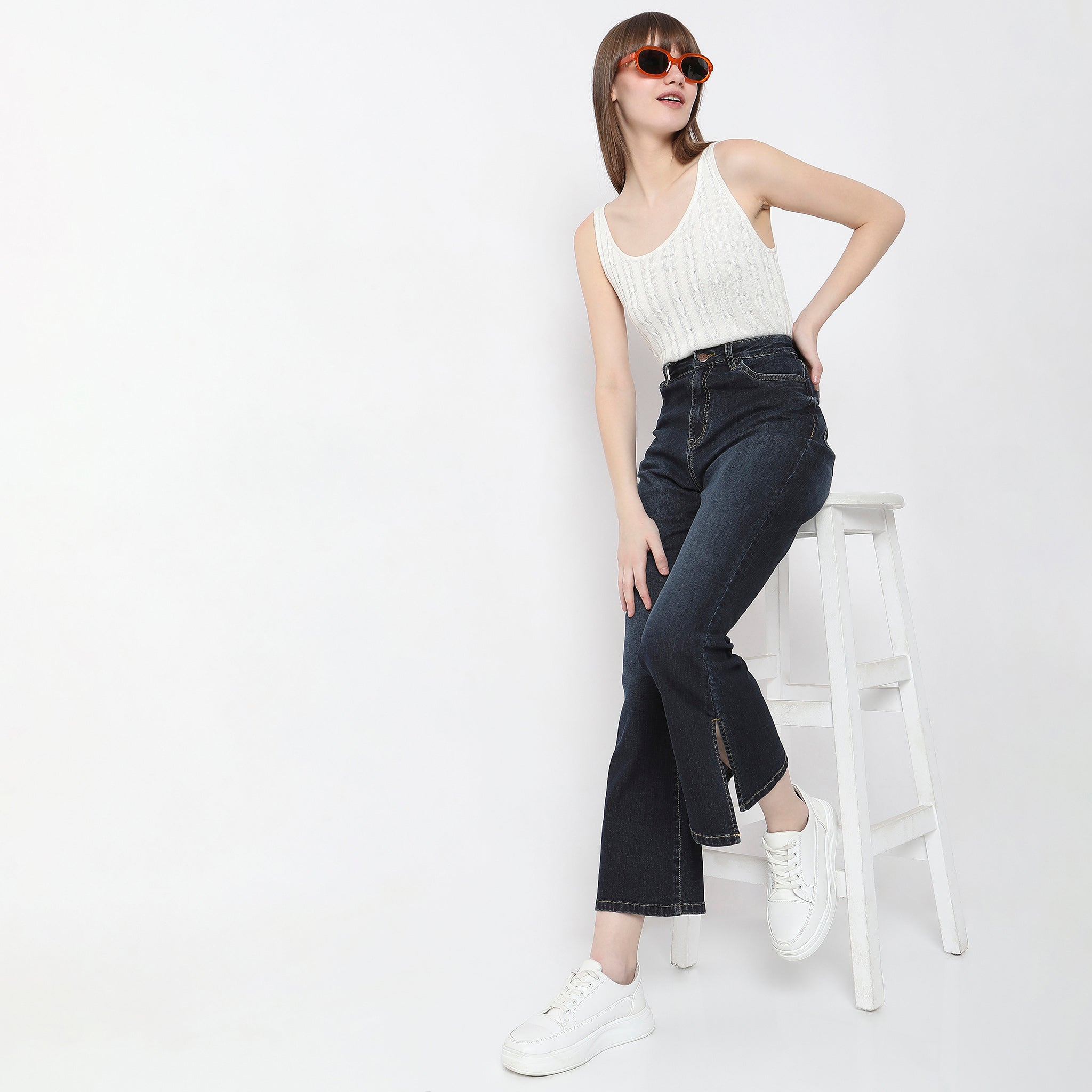 Women Wearing Boot Cut Solid High Rise Jean