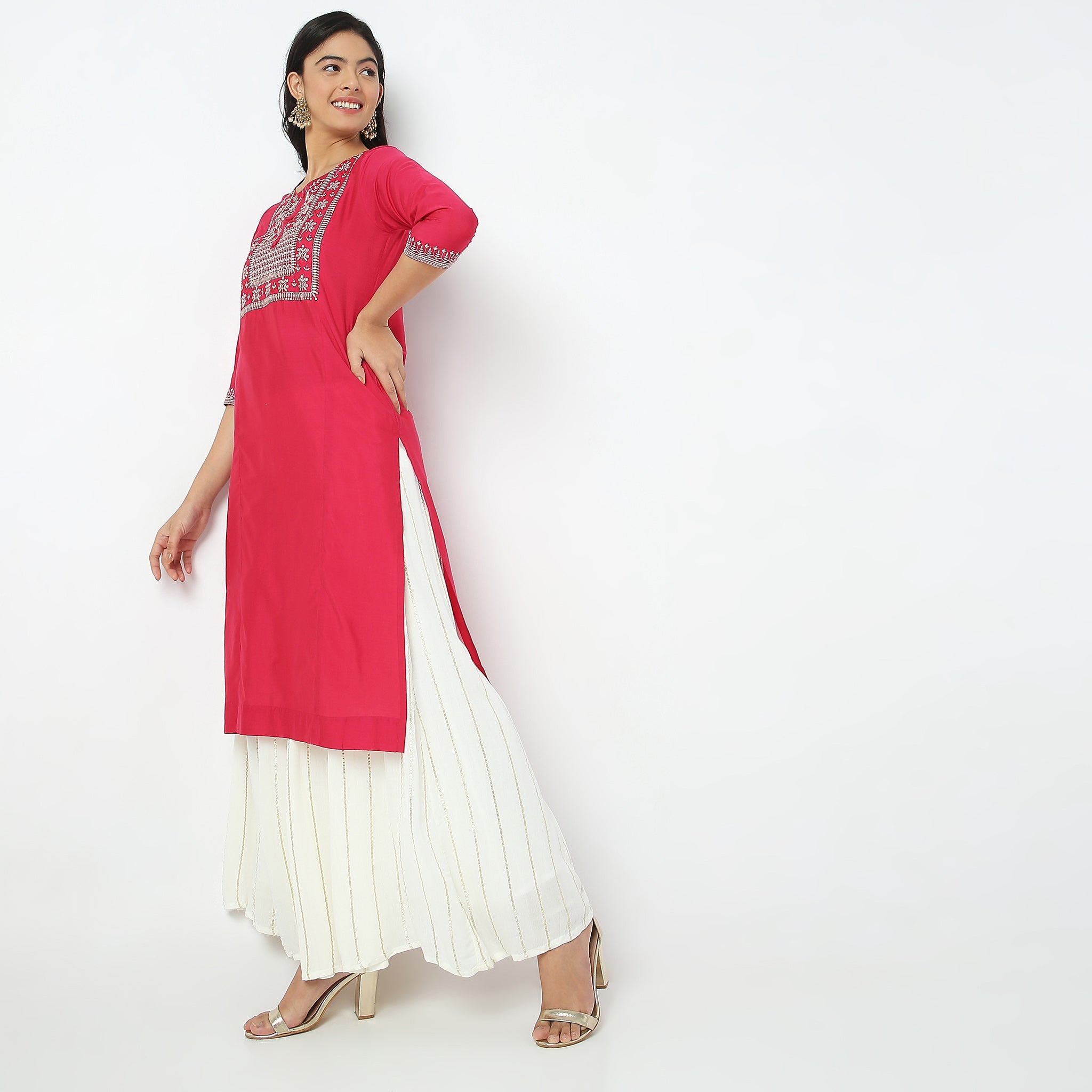 Women Wearing Straight Fit Embroidered Ethnic Set