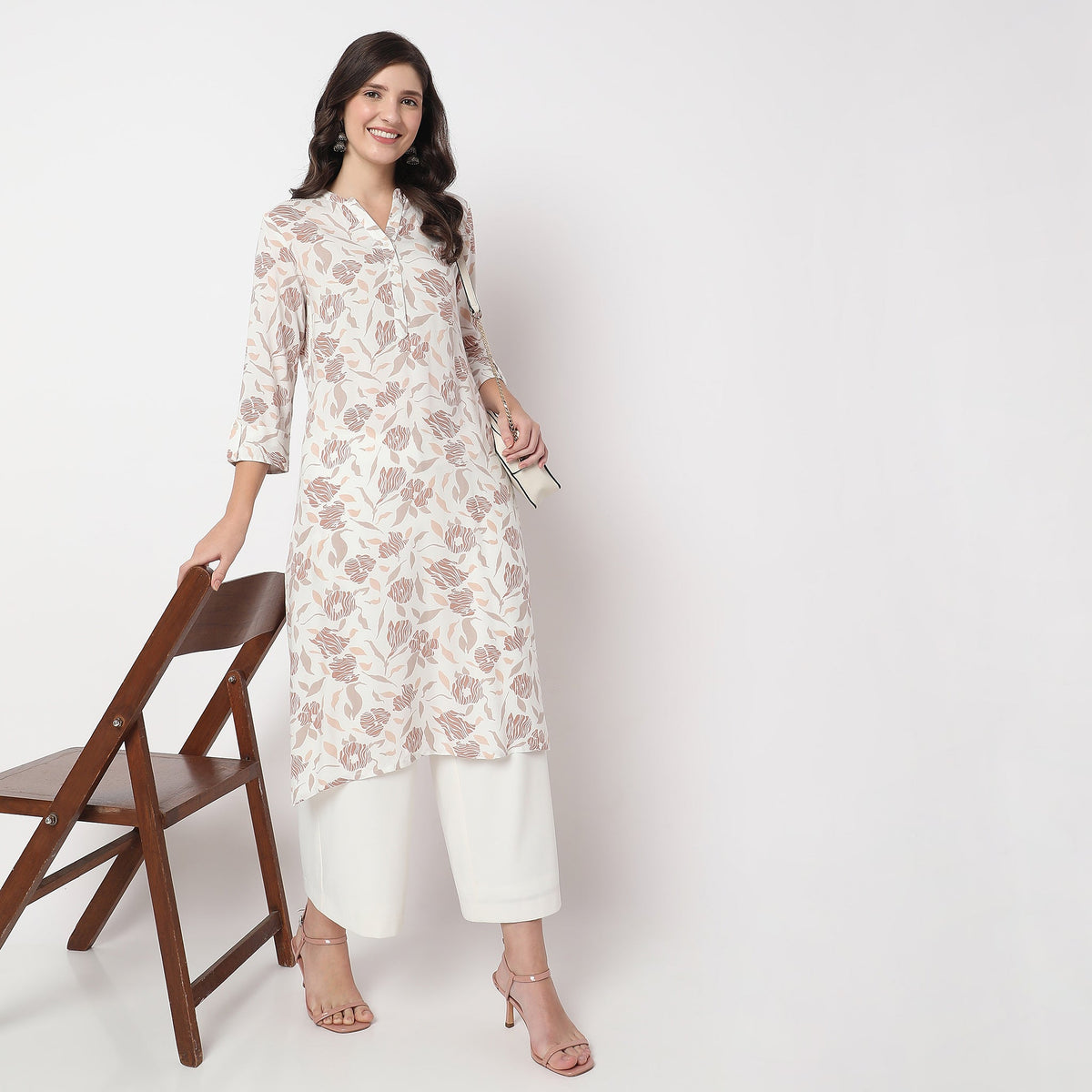 Women Wearing Straight Fit Floral Kurta