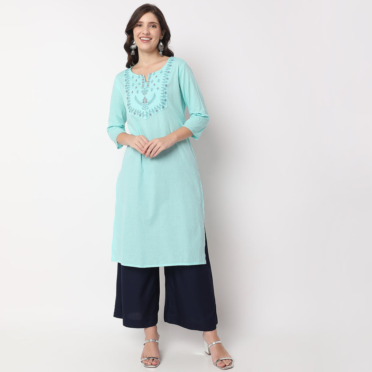 Women Wearing Straight Fit Embroidered Kurta