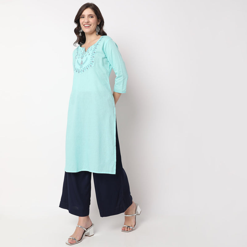 Women Wearing Straight Fit Embroidered Kurta