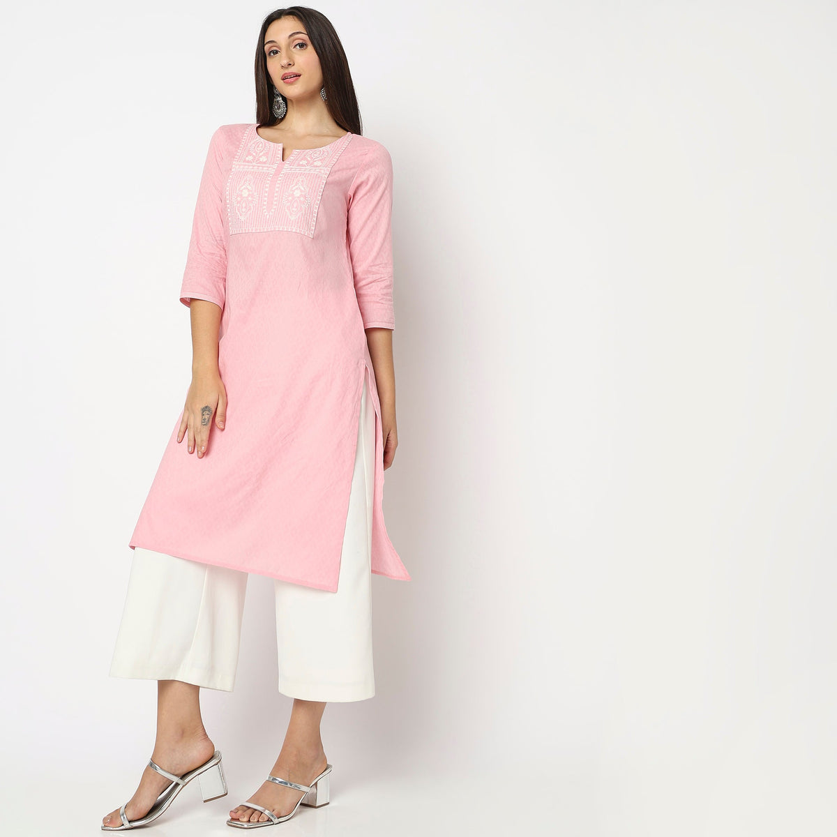 Women Wearing Straight Fit Embroidered Kurta