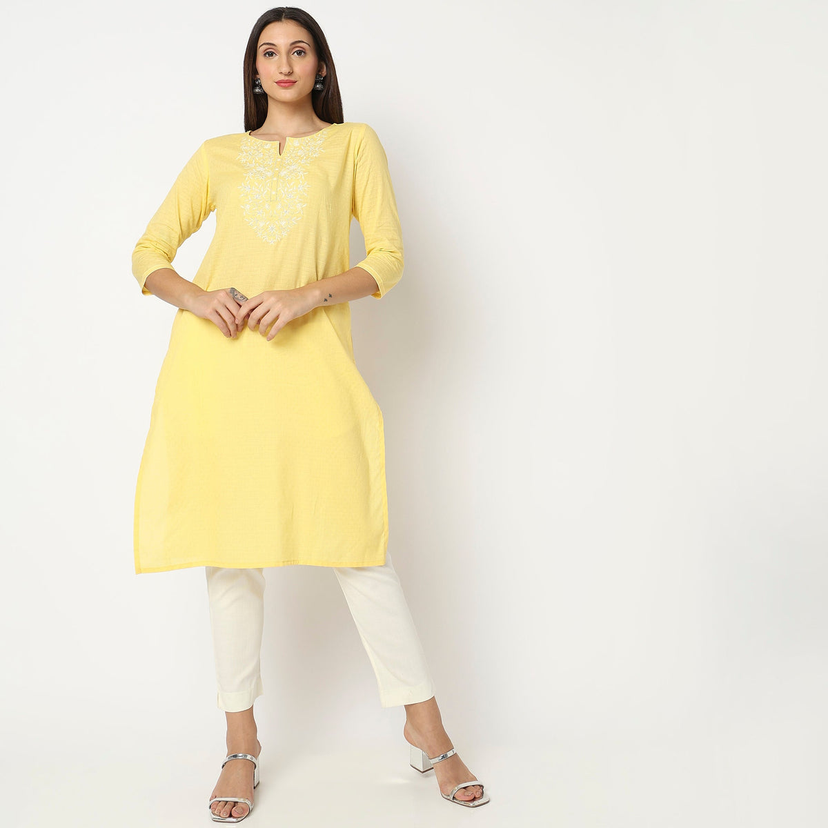 Women Wearing Straight Fit Embroidered Kurta