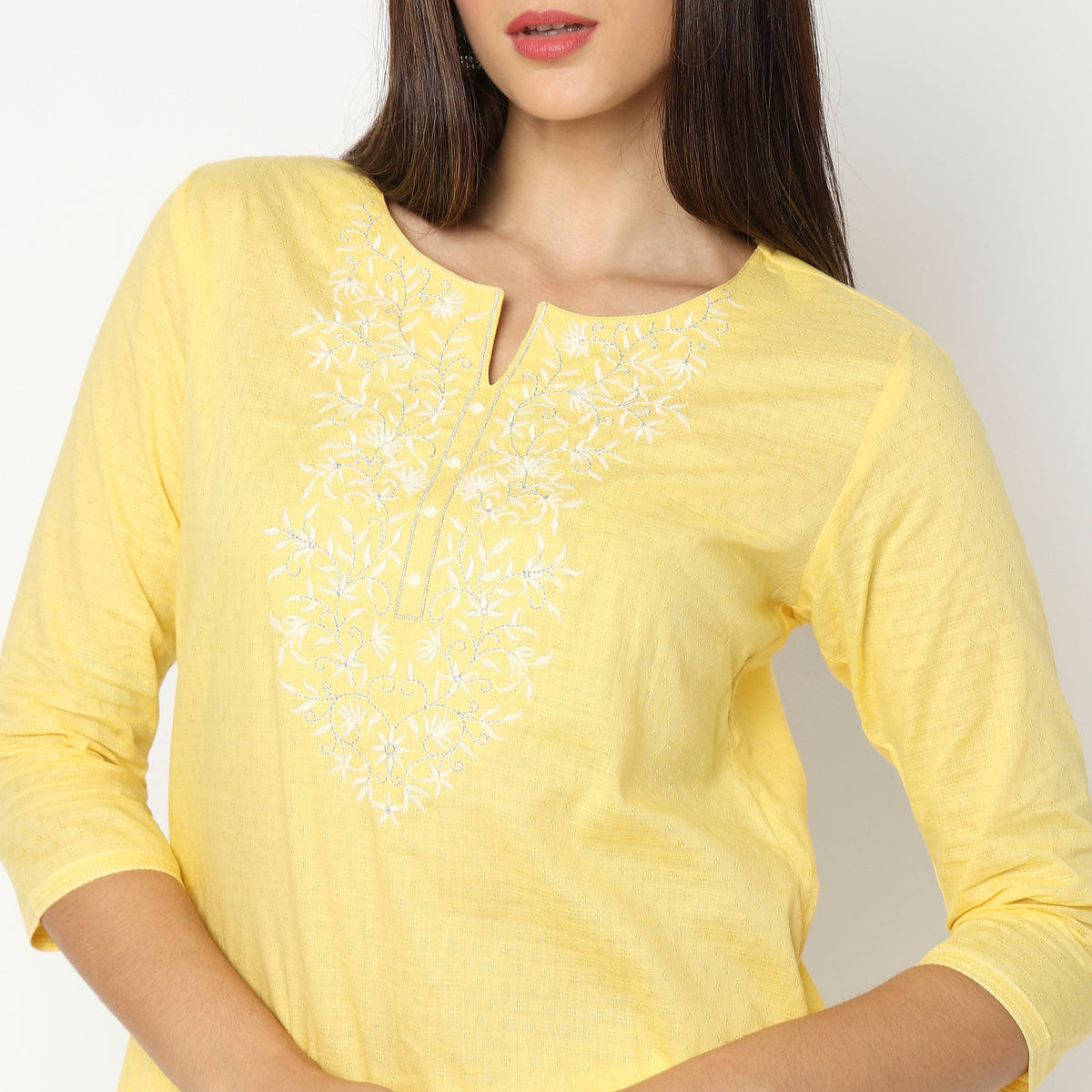 Women Wearing Straight Fit Embroidered Kurta