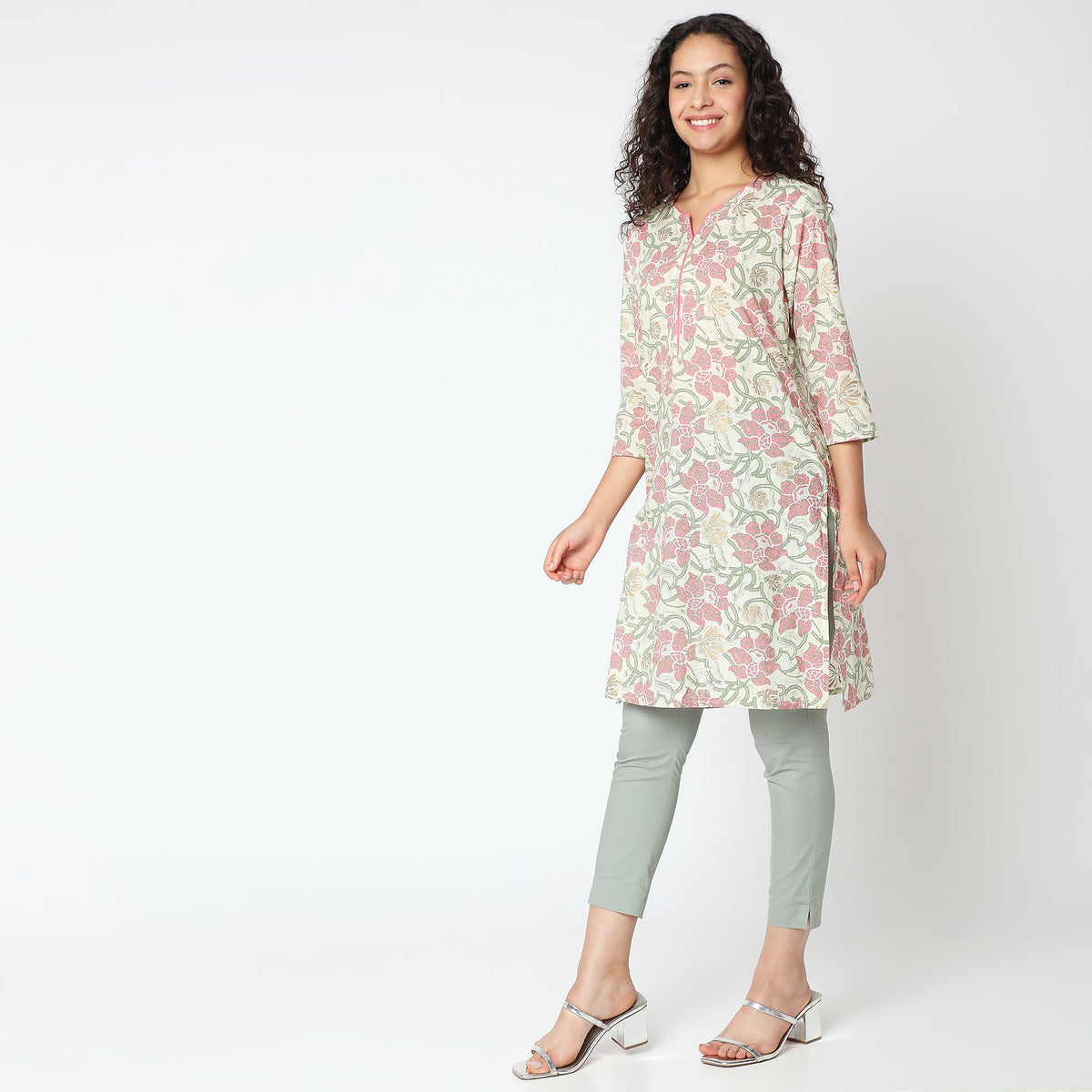 Women Wearing Straight Fit Floral Kurta