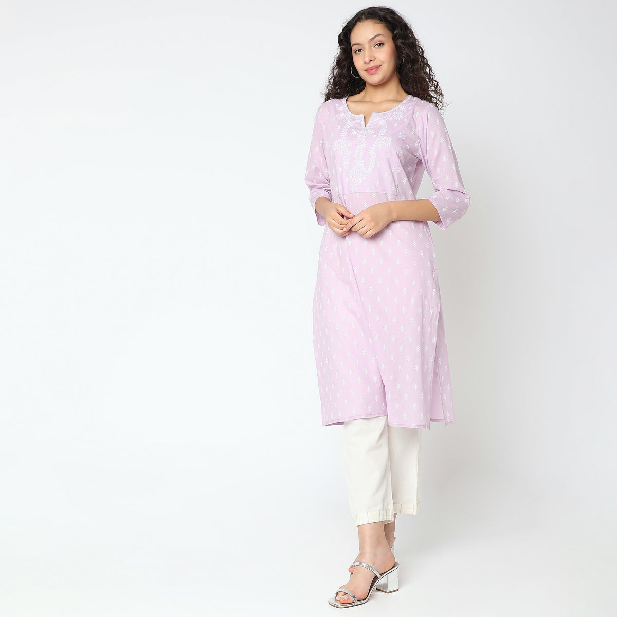 Women Wearing Straight Fit Printed Kurta