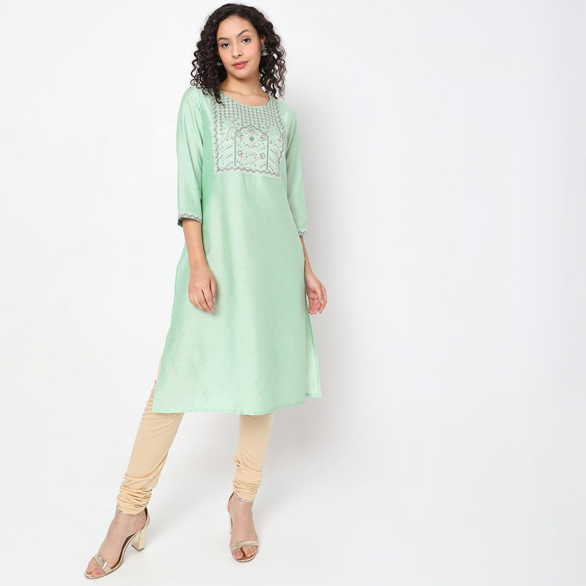 Women Wearing Straight Fit Solid Kurta