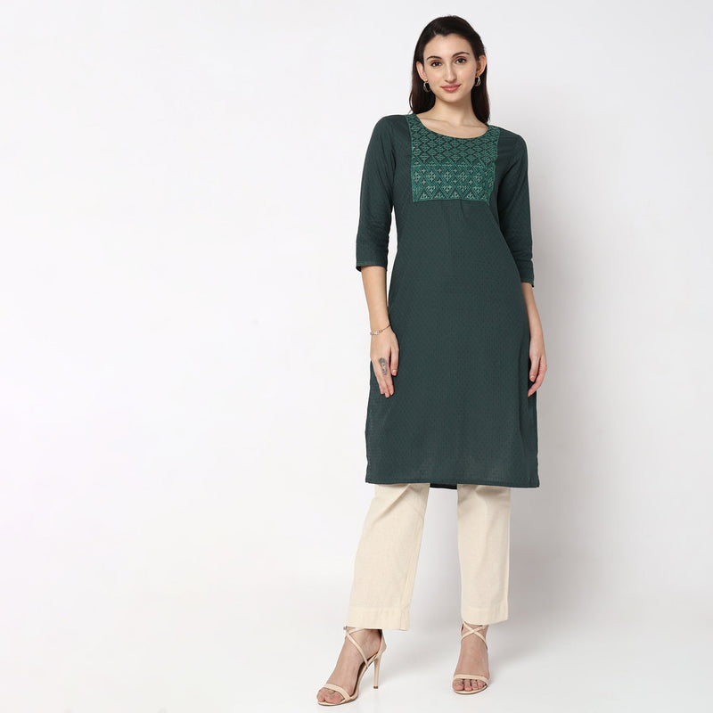 Women Wearing Straight Fit Solid Kurta