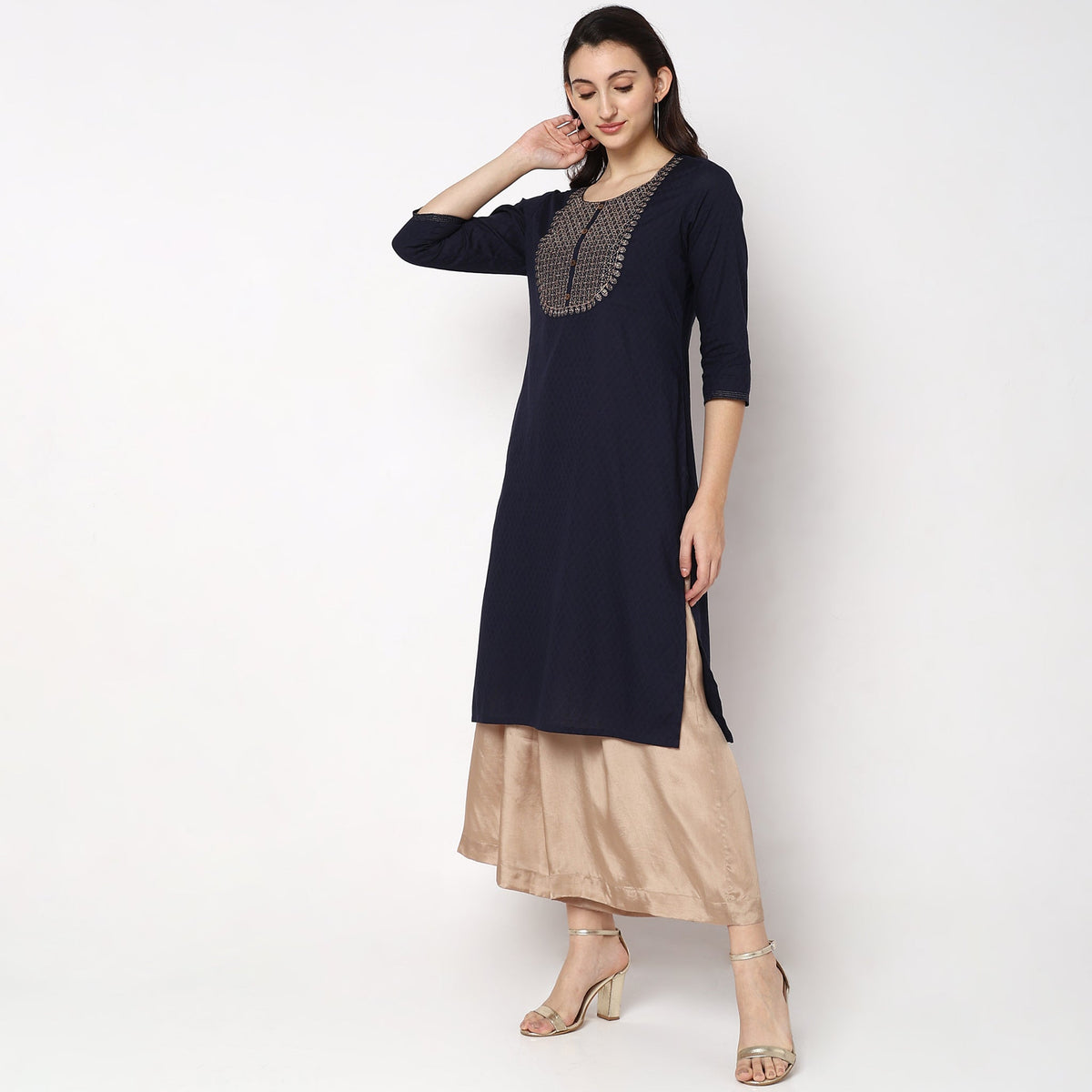 Women Wearing Straight Fit Solid Kurta