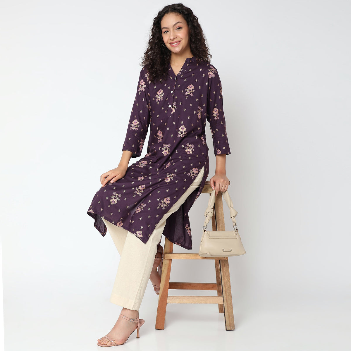 Women Wearing Straight Fit Printed Kurta