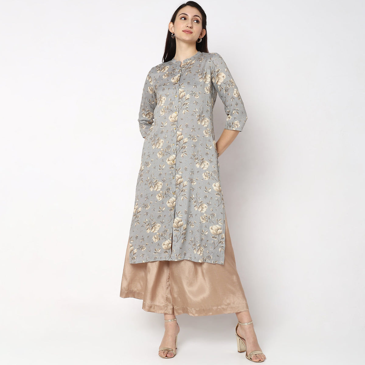 Women Wearing Straight Fit Solid Kurta