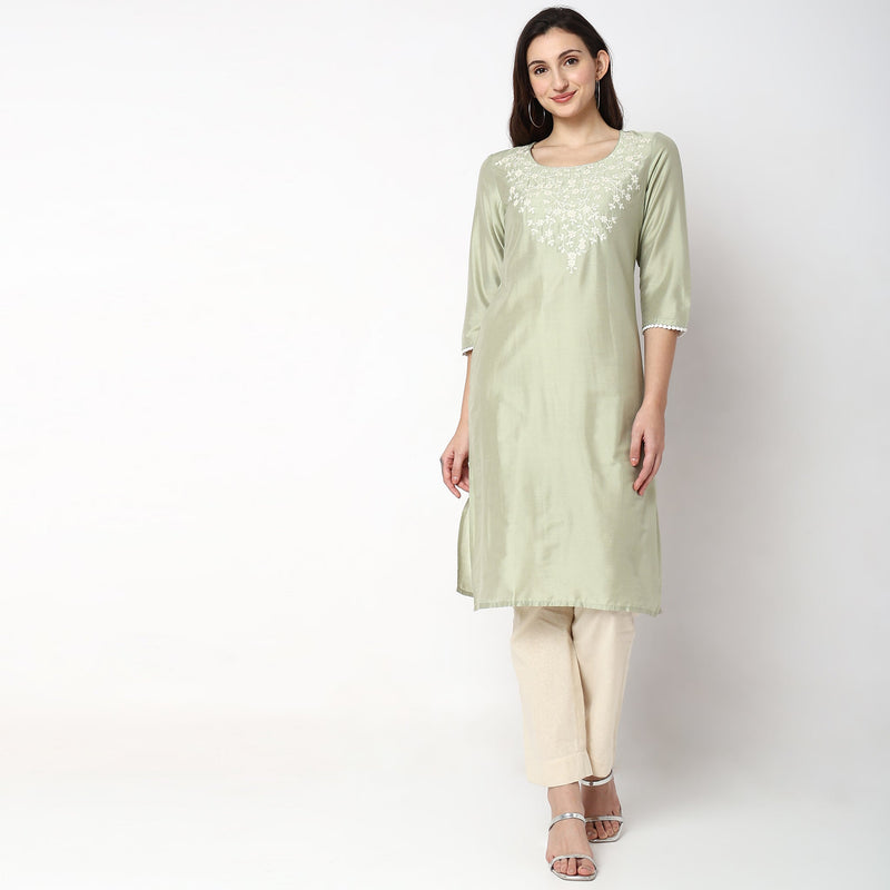 Women Wearing Straight Fit Embroidered Kurta