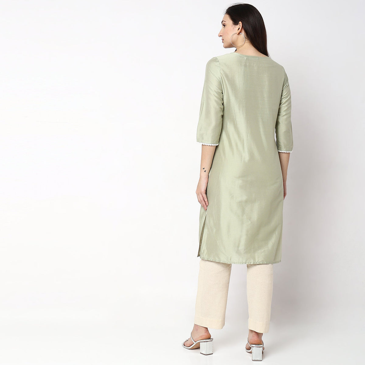 Women Wearing Straight Fit Embroidered Kurta