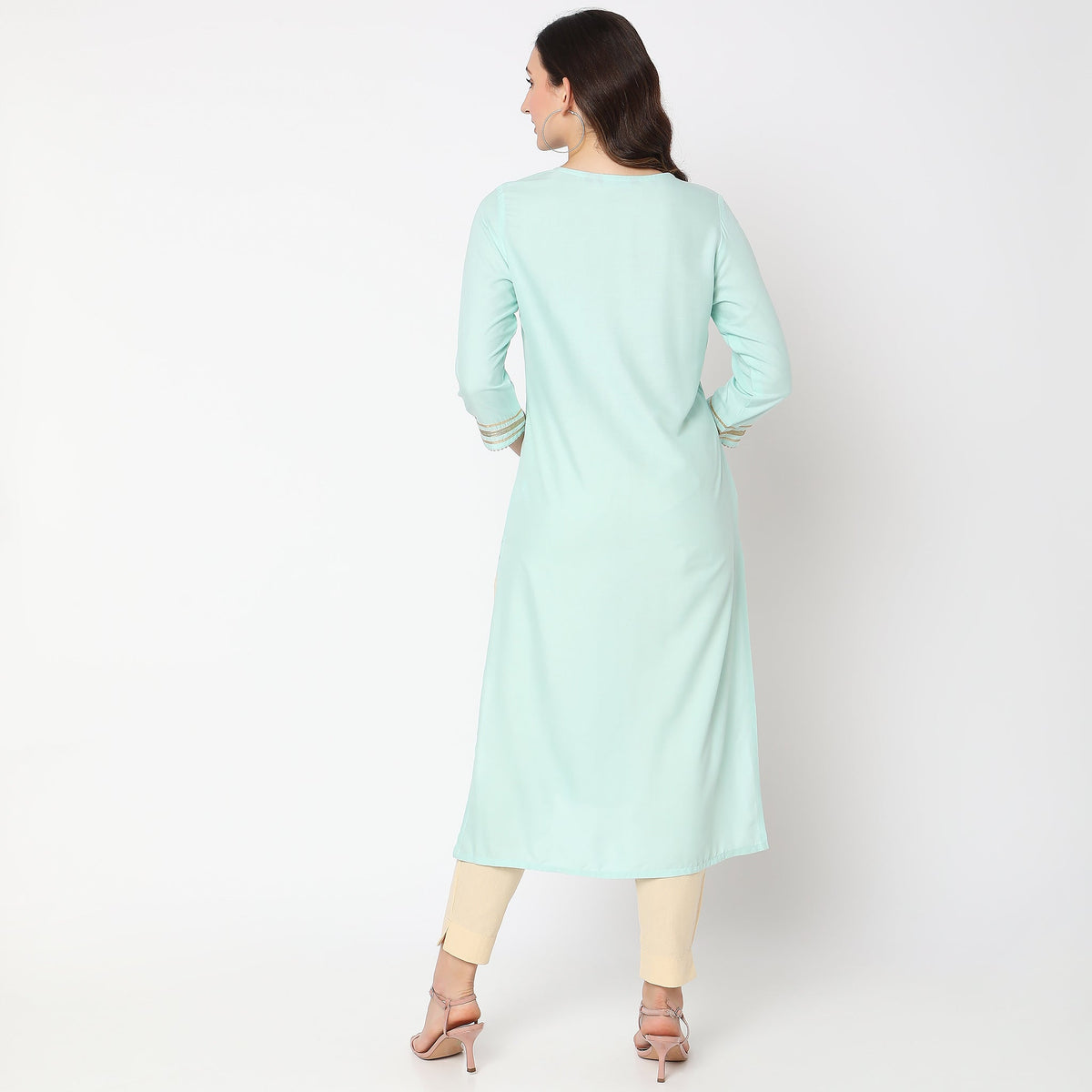 Women Wearing Straight Fit Embellished Kurta