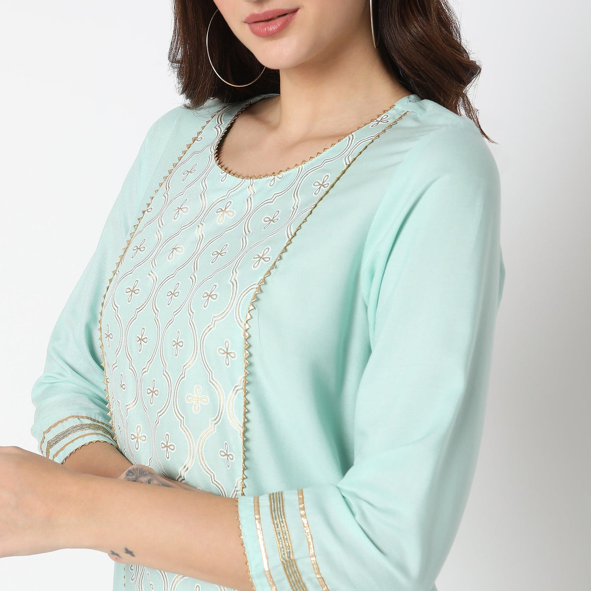 Women Wearing Straight Fit Embellished Kurta