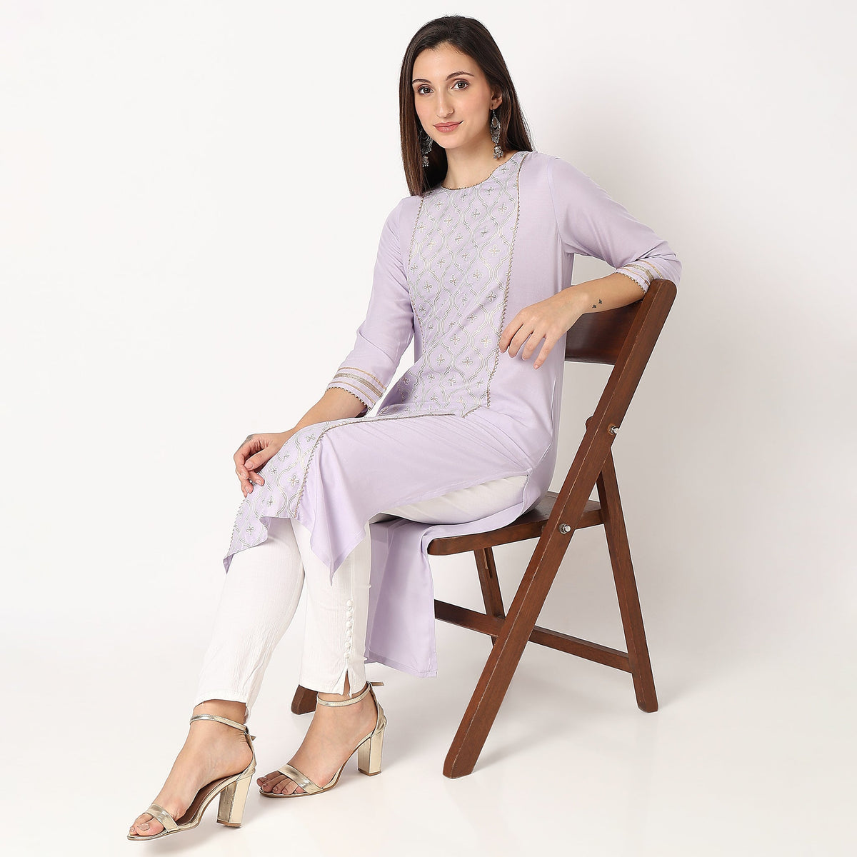 Women Wearing Straight Fit Embroidered Kurta