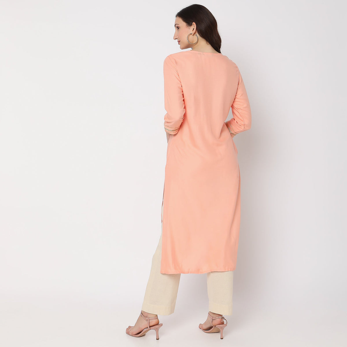 Women Wearing Straight Fit Embellished Kurta